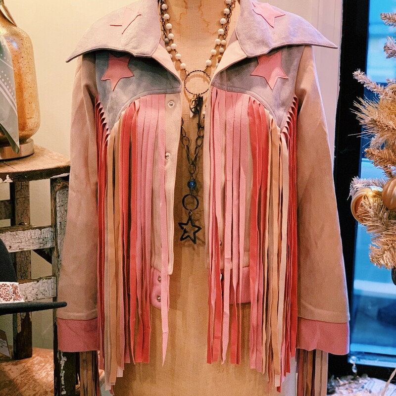 This absolutely fabulous jacket is covered in suede fringe and stars! This is one that is sure to turn heads!