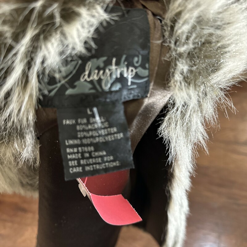 Daytrip Fur Vest, Browns, Size: L:  This is a one of a kind vest.  It has a shoulder embelishment that sets off the whole design.  What a deal, only $27.99.  You better get it before it is gone.
