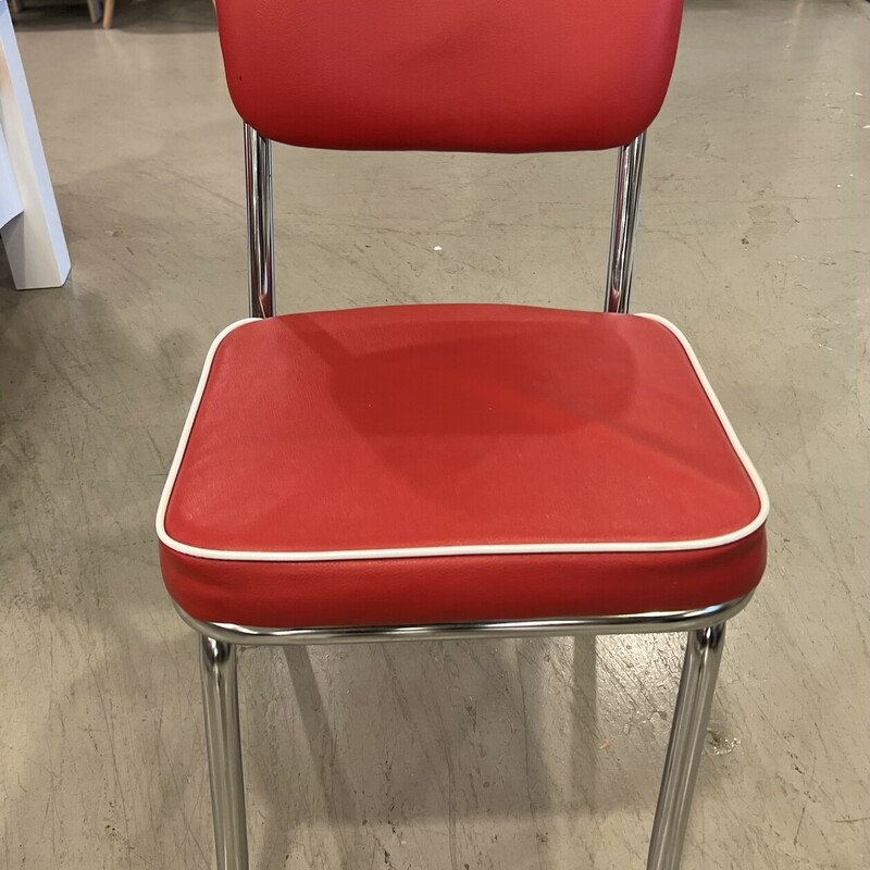 Reproduction diner table and chair set.

A very retro furniture piece for your kitchen!

Includes 1 table and 4 chairs.

Red and white round diner table with red leather metal chairs.

There is some wear, rips, and minor stains on the chairs.

There is minor wear on the table.

Chair: 19 1/2in tall (seat to floor) x 17in deep x 17in wide x 31 1/2in tall
Table: 42in diameter x 29 1/2in tall