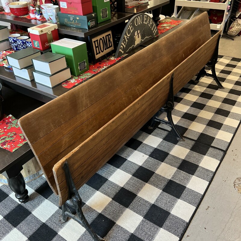 Antique Iowa train station bench.

A true antique!

Large antique train station wooden bench from Southern Iowa.

The bench seat does fold up.

Has ornate black iron legs.

There is a large chip on the corner of the bench.

There is some wear and fading on the bench.

96in long x 18in deep x 32in tall