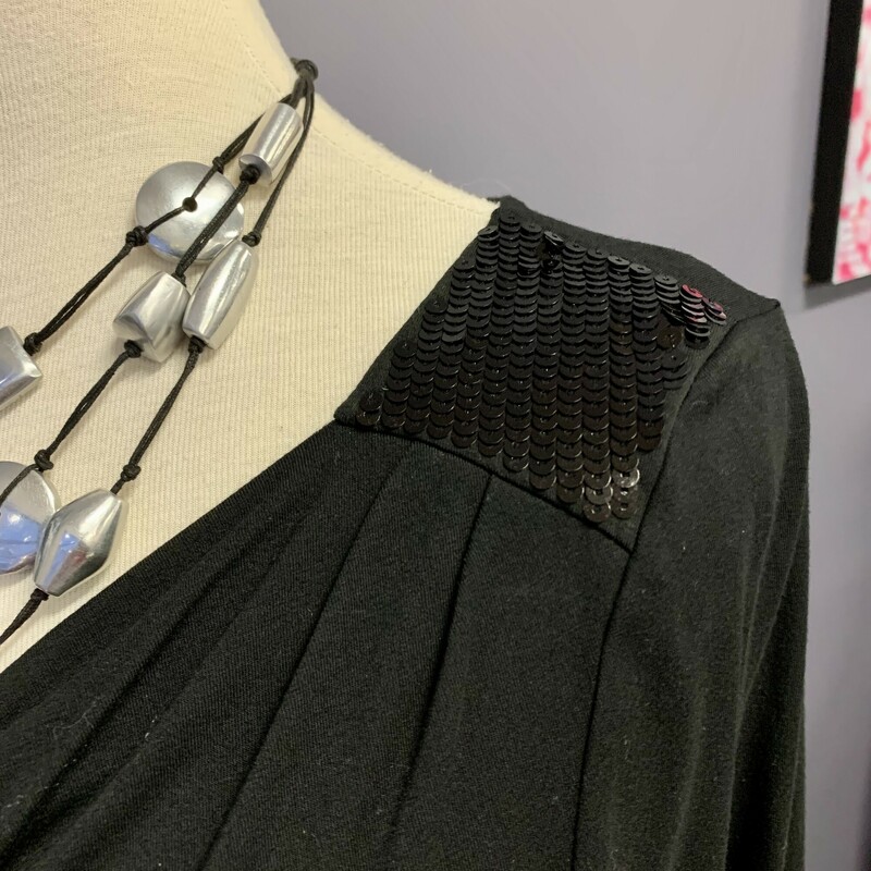 Adrienne Vittadini Top,
Colour: Black jersey with sequins on shoulder,
Size: Small