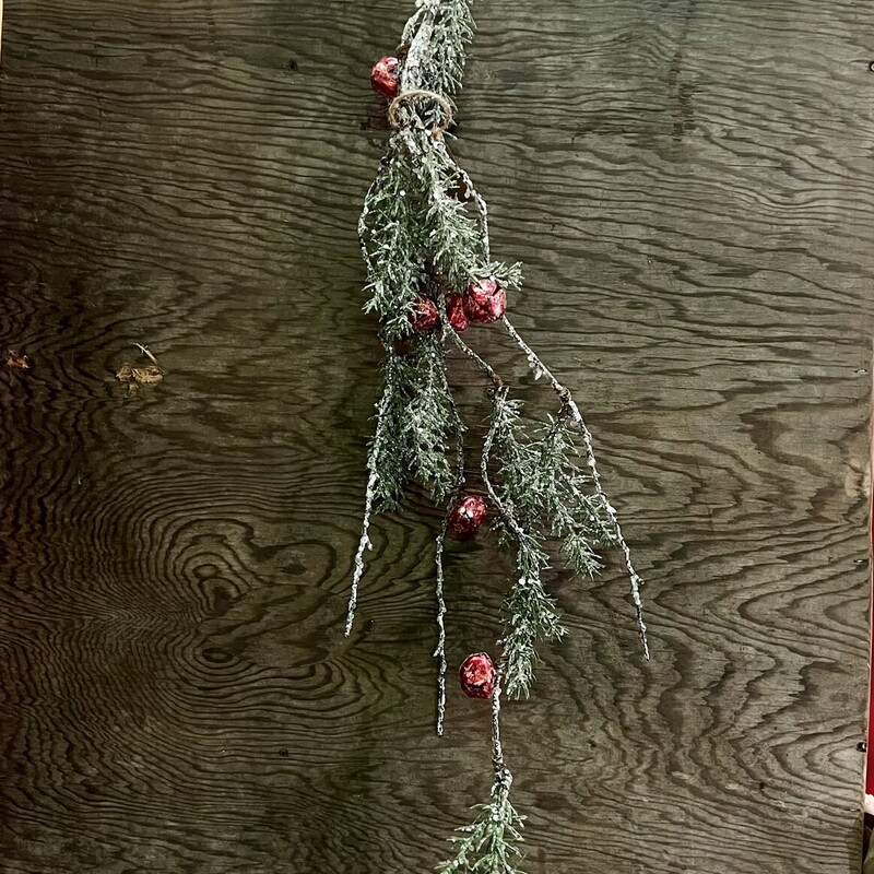This festive winter  floral features plastic pine needles and red bells on a brown wrapped stem.  Spray has been dusted with glitter for an icy look and it is perfect for use in a tall can, pitcher or vase. Drape on shelves, mantels or among any holiday display
Spray measures 42 inches