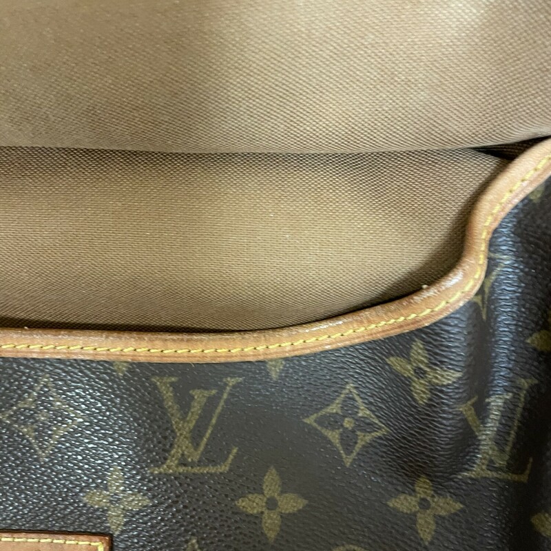 LV Saumur 35, Brown, Size: As Is.  Louis Vuitton Messenger Bag, LV Monogram, Brass Hardware With Some Discoloration On The Buckles , Leather Trim, Single Adjustable Shoulder Strap Leather Trim Embellishment, Discoloration And Cracking On The Straps And The Trim Around The Opening Of The Purse Also On The Leather Logo Plate, Canvas Lining With Some Discoloration Under The Flaps Right Behind The Buckles, Three Interior Pockets, Buckle Closures at Front & Back.<br />
<br />
Details Shoulder Strap Drop Max: 21 inches,<br />
Shoulder Strap Drop Min: 17.5 inches, Height: 12 inches, Width: 13, inches, Depth: 4 inches.