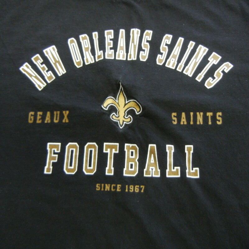 New Orleans Saints Men's NFL Team Apparel Shirt Size XL Black Cotton #11478
Rating: (see below)- 3 - Good Condition
Team: New Orleans Saints
Player: n/a 
Brand: NFL Team Apparel
Size: XL - Adult(Measured flat: Across chest 23\"; length 29\")
Under arm to Under arm; Top of shoulder to hem
Color: Black
Material: - Cotton Blend - Tag is unreadable
Style: Embroidered and screen pressed Team Short Sleeve Shirt
Condition: - Good condition: wrinkled; Material faded and discolored; Significant pilling and fuzz; Material feels coarse; Material and size tag is faded and fraying; Definite signs of use; No rips or holes(SEE PHOTOS) 
Shipping: $4.20 
Item # 11478 