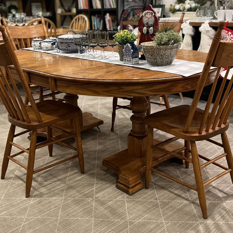 Oak table and chairs set.

Includes 1 table, 4 chairs, and 2 leaves.

Beautifully carved oak wood family dining table with 4 chairs.

The leaves are already in the table.

There is minor wear and marks on the table and chairs.

Table: 47 1/2in deep x 68in wide (w/ leaves) x 29in tall
Chair: 40in tall x 16 1/2in deep x 16in wide x 18in tall (seat to floor)