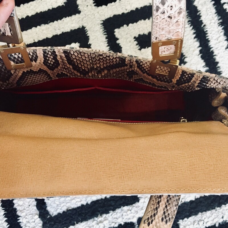 Suen Cooper shoulder bag is made of alligator on exterior and the interior is lined in leather. Gold hardware on the straps. Does have a few exterior scratches, but still has lots of love to give! Retail: $4000 Such a steal!!!