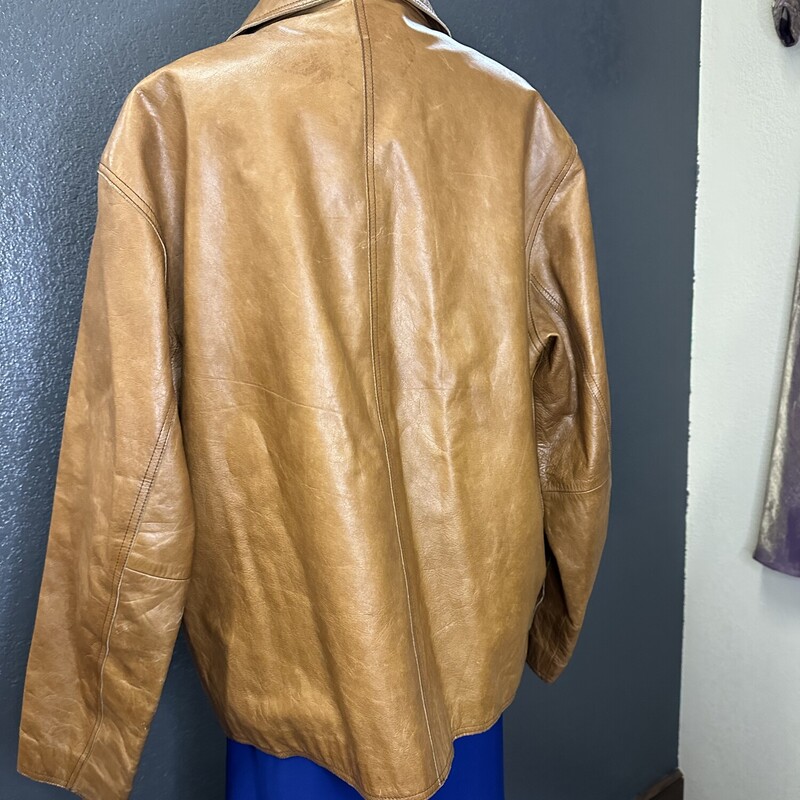 Gap leather zip up jacket with poly lining, two side pockets. very nice condition.  lovley golden brown color.