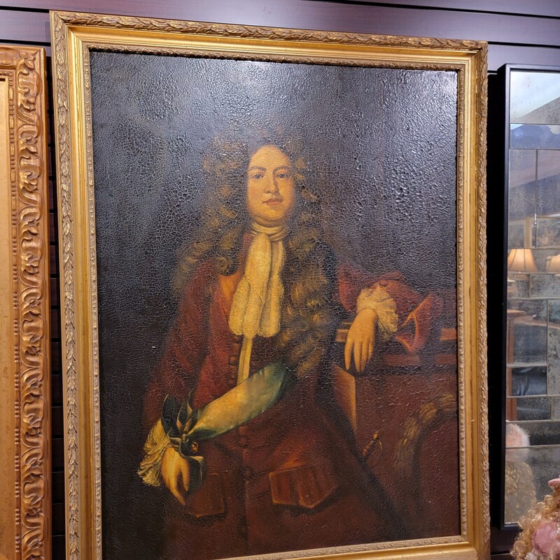 Large Decorative Painting of an Aristocrat with absolutely stunning frame.  Oil Painting is made to look old; crazed.   Measures 42' wide; 54' tall.