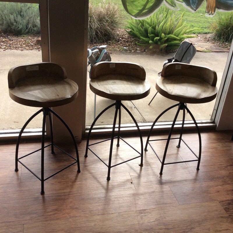 This is a set of 3, light pine wood, Low Back Bar Stools with metal legs.