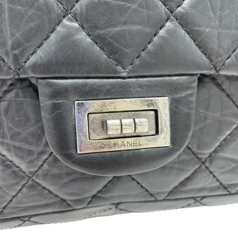 Chanel Reissue 226 Flap Purse<br />
Color: Black, Silver<br />
<br />
Size: 12.5 W, 8 H
