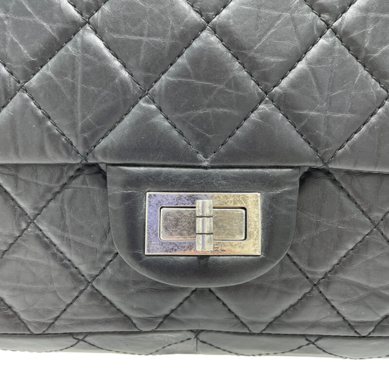 Chanel Reissue 226 Flap Purse<br />
Color: Black, Silver<br />
<br />
Size: 12.5 W, 8 H
