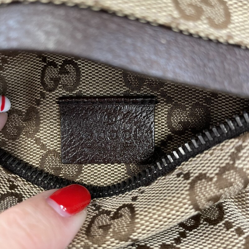 Gucci GG Canvas Belt Bag<br />
Strap is adjustable and is in great shape! Two zippered pockets and one with velcro.<br />
<br />
Strap Length: 31.25<br />
Height: 6.75<br />
Width: 11.75<br />
Depth: 0.5<br />
<br />
shipping may have addtional charge for insurance.