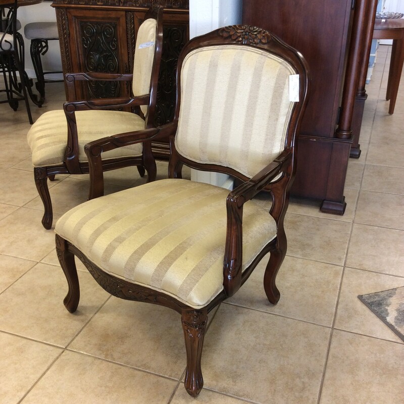 Traditional in style, this accent chair features lovely carved details and a 2-toned gold uphostery. Best of all, we have 4 of them priced separately.