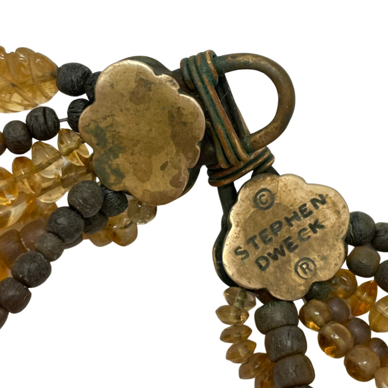 Stephen Dweck Necklace<br />
7 Strand 18in<br />
Amber, Citrine, and Glass Beads<br />
Signed Brass Clasp
