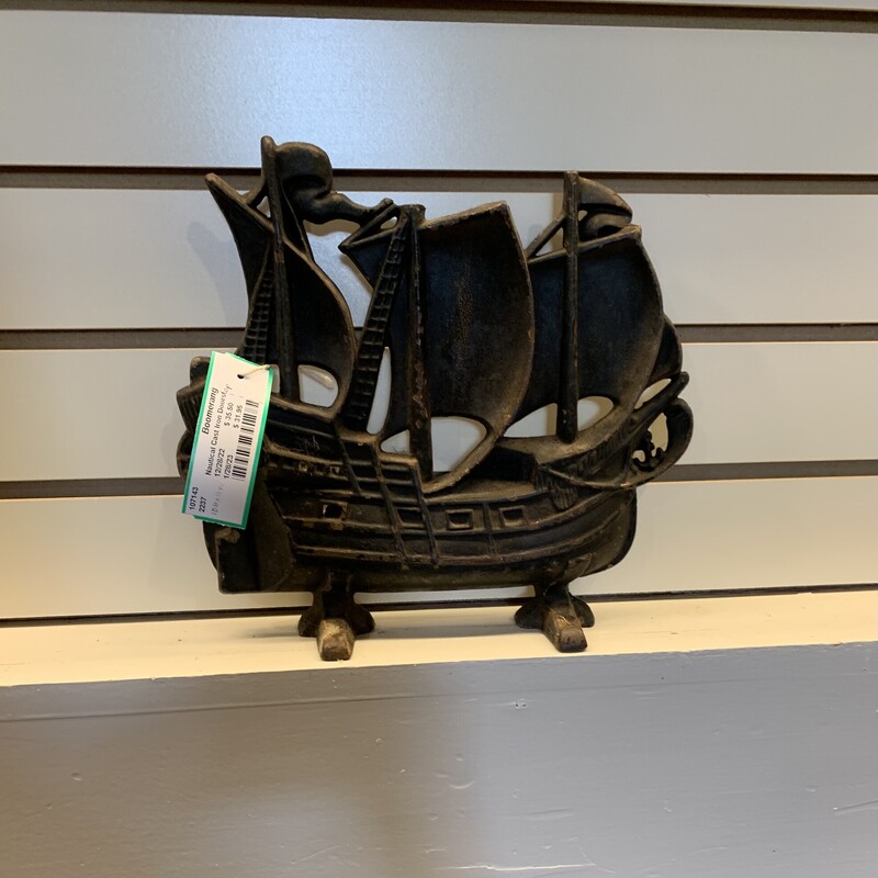 Nautical Cast Iron Doorstop - $35.50.
10 inches High X 11 inches Wide
(Note: Small piece broken off top)