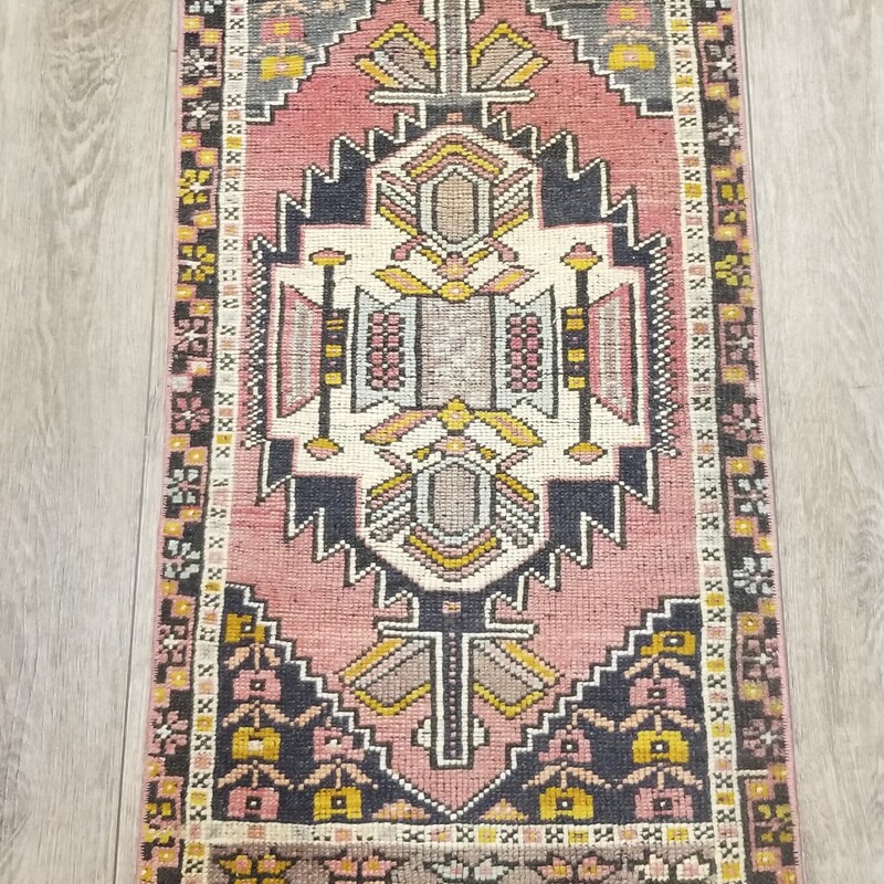 Hand woven area rug. 42in x 21in