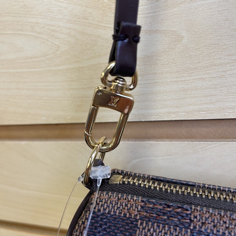 Sale!! was $499.99 NOW $399.99<br />
<br />
Louis Vuitton Mini Papillion, Damier, Brown Coated Canvas Check Pattern with a Rust Leather Lining, Brown Leather Strap, Gold Hardware, Zippered Closure<br />
<br />
Size: Length: 6 inches, Depth: 2.25 inches, Strap Drop: 5.5 inches<br />
<br />
*Additional shipping and insurance rates will apply. A separate invoice will be sent due to the value of this item.