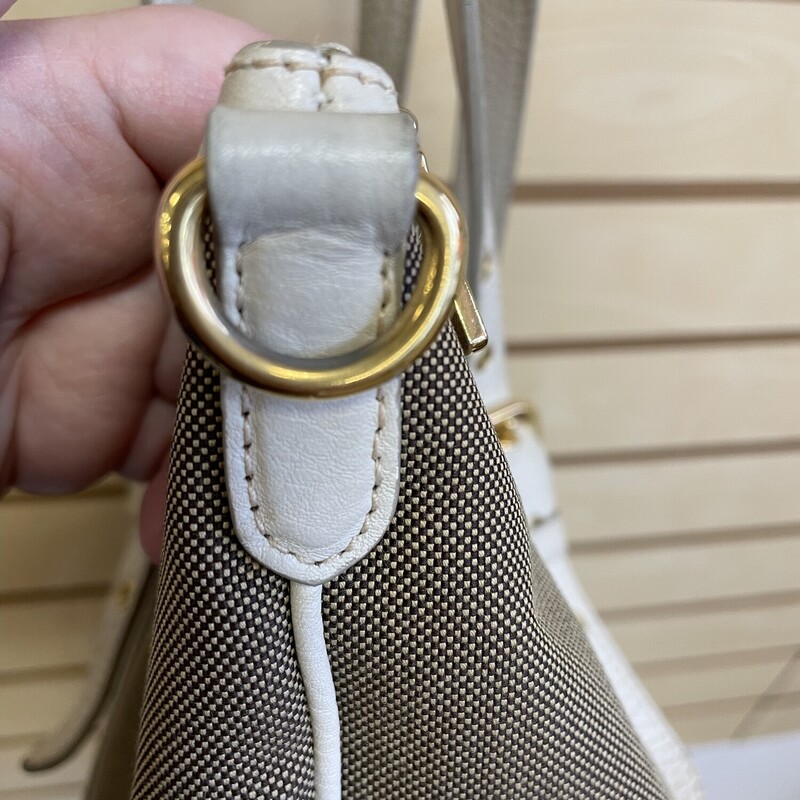 Prada Purse, Khaki Fabric with Cream Accents, Gold hardware and Picture Keychain, Prada Logo on Front, 1 Large Zippered Pocket and 1 Small Pocket Inside, Size: 11 1/2 x 6 x 14  Inches

*Additional shipping and insurance rates will apply. A separate invoice will be sent due to the value of this item.
