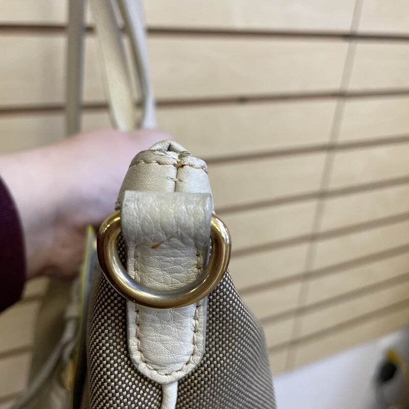 Prada Purse, Khaki Fabric with Cream Accents, Gold hardware and Picture Keychain, Prada Logo on Front, 1 Large Zippered Pocket and 1 Small Pocket Inside, Size: 11 1/2 x 6 x 14  Inches

*Additional shipping and insurance rates will apply. A separate invoice will be sent due to the value of this item.