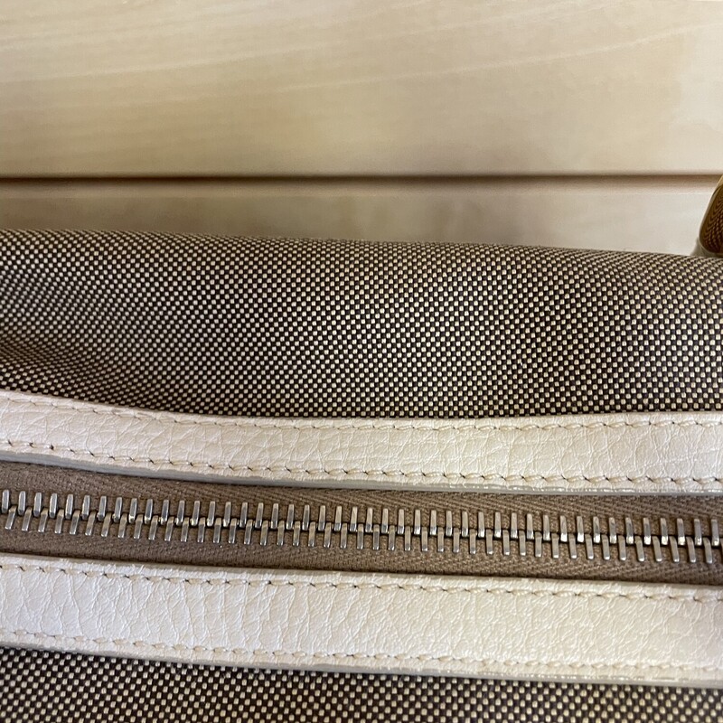 Prada Purse, Khaki Fabric with Cream Accents, Gold hardware and Picture Keychain, Prada Logo on Front, 1 Large Zippered Pocket and 1 Small Pocket Inside, Size: 11 1/2 x 6 x 14  Inches

*Additional shipping and insurance rates will apply. A separate invoice will be sent due to the value of this item.