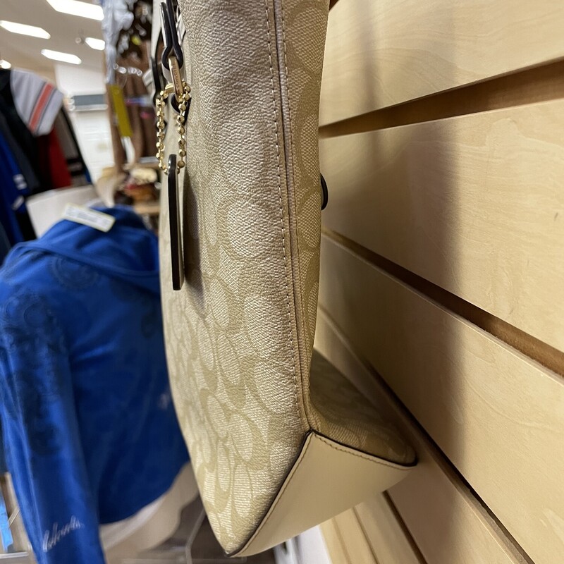 Coach Purse, Khaki with Cream Accents and Coach (C) Design, Brown Lining, Gold Hardware, Coach Logo on Front and Zipper in Back, 1 Zippered Pocket and 1 Split Pocket, Size: 10 x 4 x 13 inches