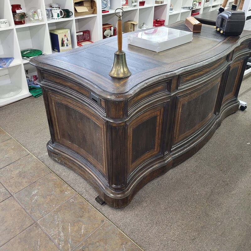 Hooker Executive Desk, Dimensions

Width: 73 (185.4 cm)

Depth: 36 1/2 (92.7 cm)

Height: 30 3/4 (78.1 cm)

Weight: 415.8 lb (187.1 kg)

Volume: 60.1 cu ft (1.7 m3)

Carton: 75.25 L x 40 W x 34.5 H (191 cm x 102 cm x 88 cm), 470.8 lb (211.86 kg)
Design Elements & Features

Features: Drop-down keyboard drawer
Removable mouse pad
Removable pencil tray
Removable dividers
Letter/legal pendaflex in left side front drawer
Locking file drawer
Seven drawers total
Keyboard opening: 26W x 16 - 19 1/4D x 2H
Knee space: 28 1/4W x 30 1/4D x 24H

Material: White Oak and Walnut Veneers with High Quality Bonded Leather and Resin

Finish: Dark Wood

Finish: MULTI: A timeworn saddle brown (BRN) that is paired with an anthracite black with light dusty-wax hang up (BLK) to create a two-tone finish that is as authentic as the countryside from with it emanated. The custom-crafted hardware in an aged pewter finish has shaped back plates and is inspired by hand-wrought ironworks from Texas Hill Country. Distressing includes rasping, hand planking, gouging, chopping and worm holes.

Style: Traditional

Collection: Hill Country

Number of Shelves: 0

Number of Drawers: 7

Number of Leaves: 0