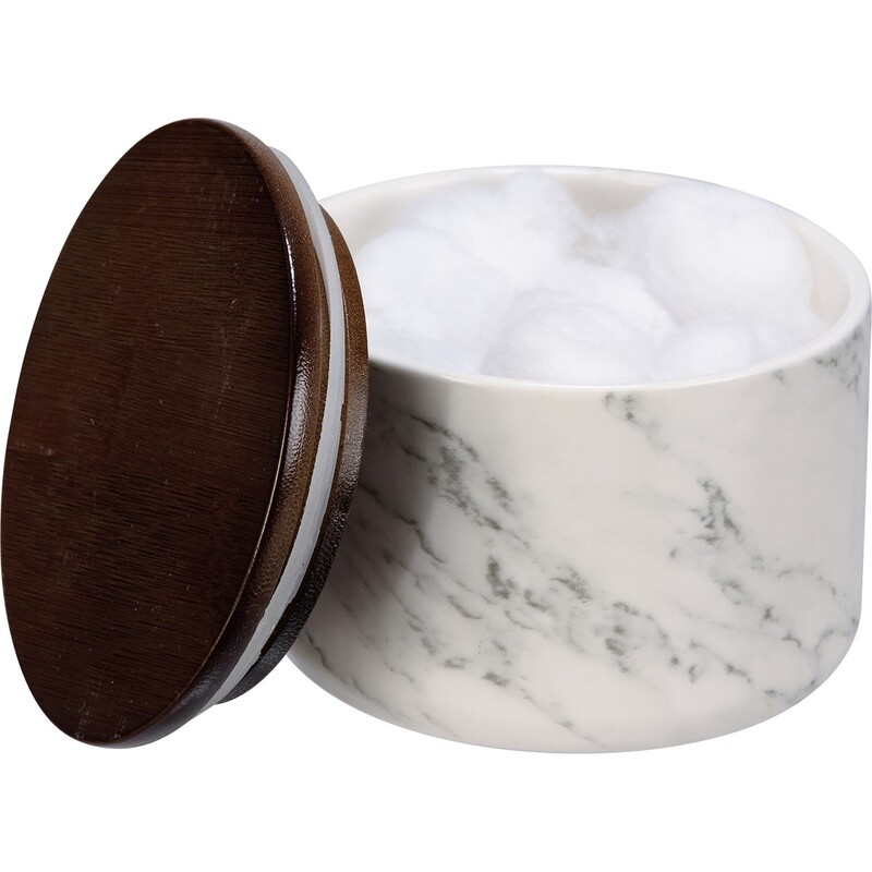 Marbled Canister,
SKU: 113778
A marbleized stoneware canister from our Room By Room Collection with a wooden lid. Our Marbelized canister is perfect for keeping food fresh or storing various items. Food safe, Not microwave safe. Hand-wash only.
Dimensions:	4 Diameter x 3
Material:	Stoneware, Wood
UPC:	190134137786
Artist:	Primitives by Kathy