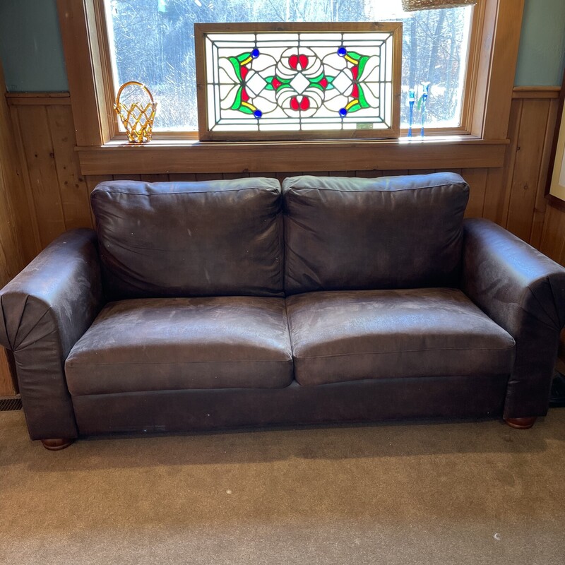 Eco Leather Sofa
Size:  7 feet
Brown recyced leather sofa is excellent condition.  The bottom two cushions are removable.  It is extremely comfortable.  It would go with any decor.