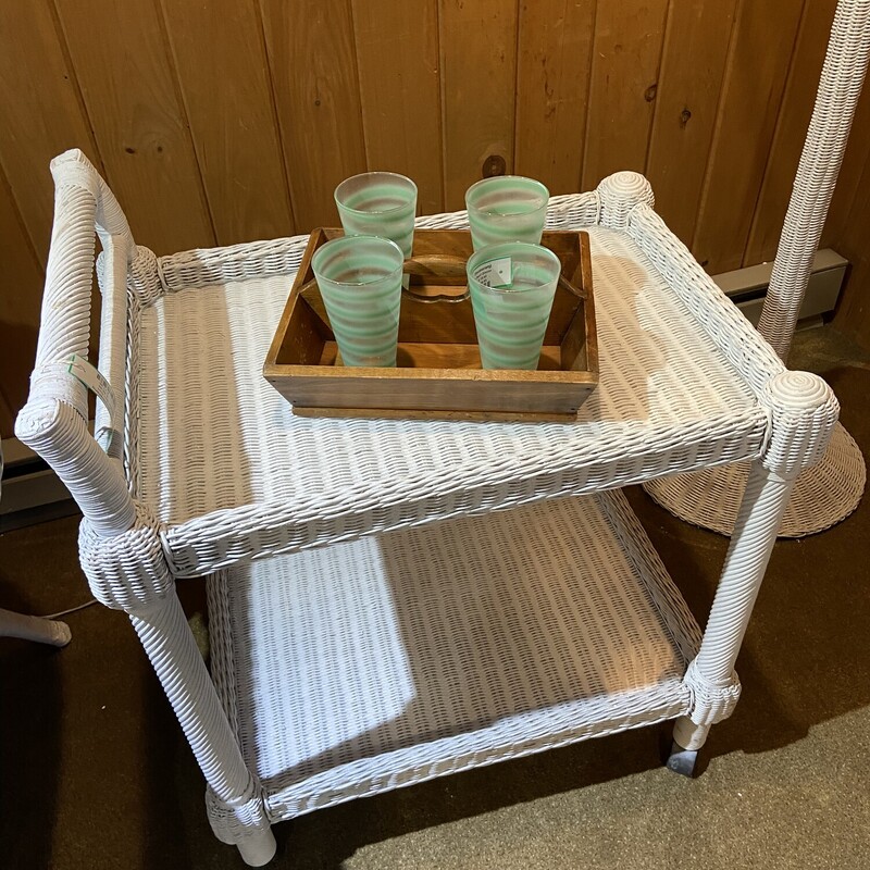 White Wicker Bev Cart
 Size: 26x18x31
A fun way to create a portable bar or simply create some sliding storage.
This piece has a plexiglass bottom to create a level
surface.
 Outdoor furniture covers come with the item.