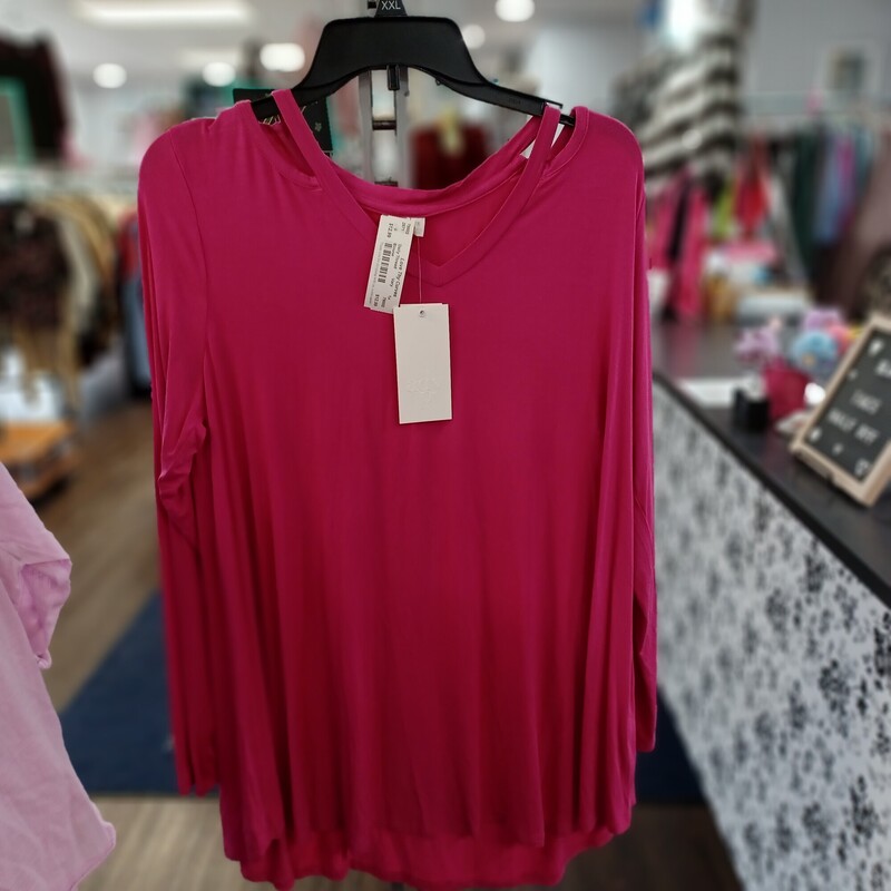 Love this magenta pink long sleeve top that is super lightweight and super soft! Has a cute cut out on the shoulder ... like a little peek a boo! Brand new with tags by Ady P