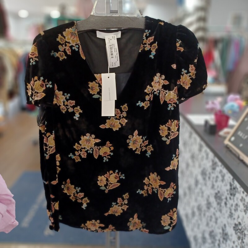 Loving this velour blouse in black with sheer floral design. Short sleeve and ready to welcome in spring and summer. Brand new with tags by Adyson Parker.