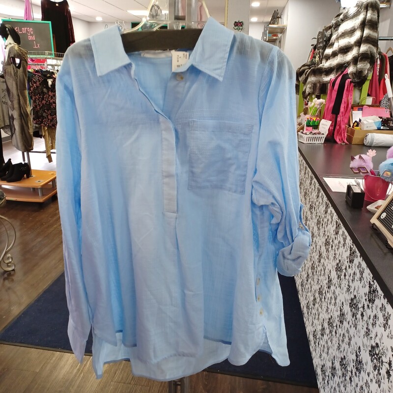 Soft blue is a great color for summer or spring. This lightweight textured blouse is a half button up front that can be worn with long or half sleeves (has a tab/button feature on arm). Brand new with tags by Adyson Parker.