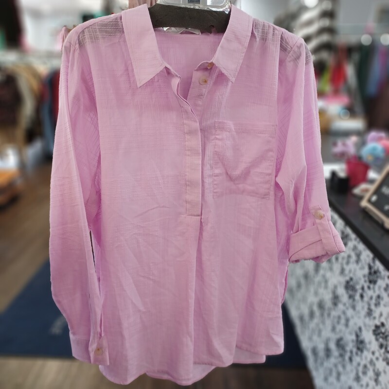 Soft pink is a great color for summer or spring. This lightweight textured blouse is a half button up front that can be worn with long or half sleeves (has a tab/button feature on arm). Brand new with tags by Adyson Parker.