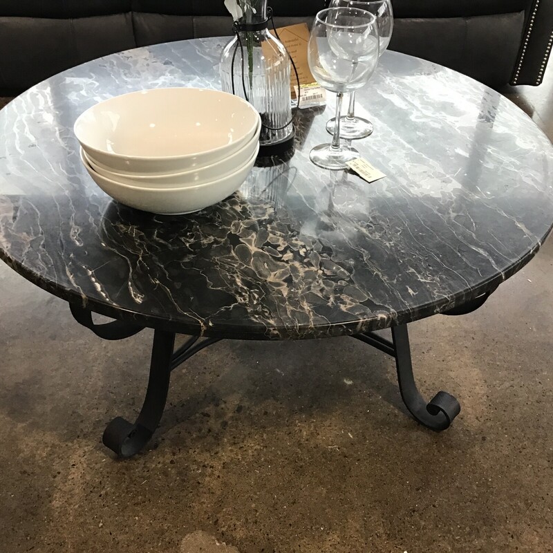 This gorgeous round coffee table features vintage marble from the 1950s! This black and white marble slab sits on an iron base from Arhaus Furniture. This is a one-of-a-kind addition to any home!
Dimensions are 36 in. x 17 in.
