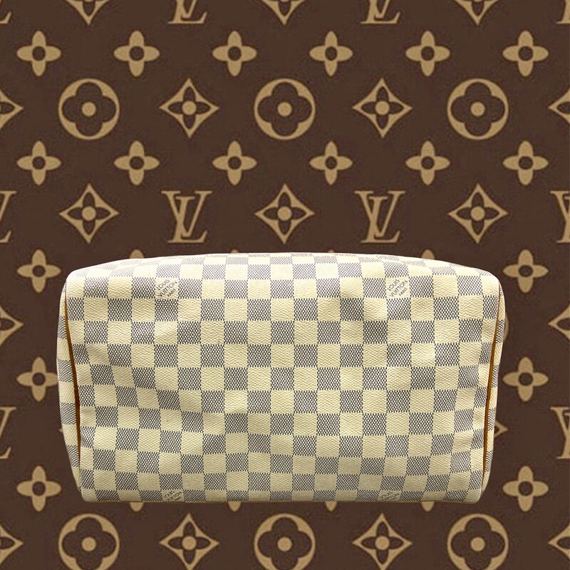 Louis Vuitton<br />
This is an authentic LOUIS VUITTON Damier Azur Speedy 30. This is a stylish, iconic tote, crafted of Louis Vuitton Damier coated canvas in blue and white. The handbag features natural vachetta cowhide leather trim and rolled top handles with brass handle rings. The brass top zipper opens to an interior of beige fabric with a hanging patch pocket.<br />
<br />
Base length: 12 in<br />
Height: 8.5 in<br />
Width: 7 in<br />
Drop: 3.5 in<br />
COMES with CERTIFICATE of AUTHENTICITY<br />
This Speedy is pre-loved and does show signs of wear.