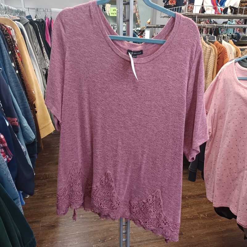 Such a cute short sleeve knit top in pink with a knit lace bottom for added flair. Perfect with your favorite jeans!