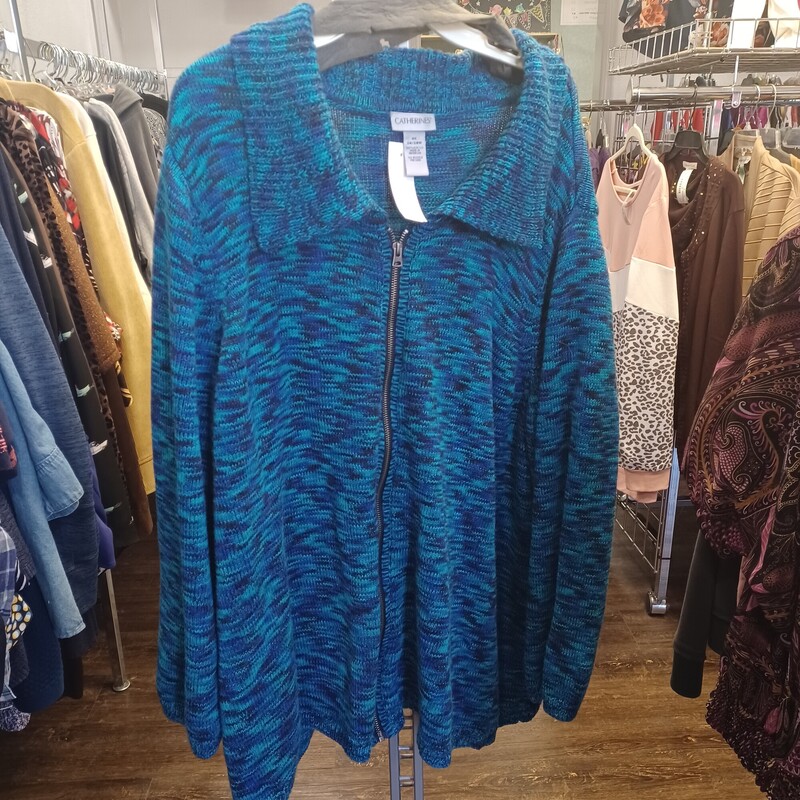 Loving this zip up cardigan in teals, blues and black. It is perfect for layering and sure to please.