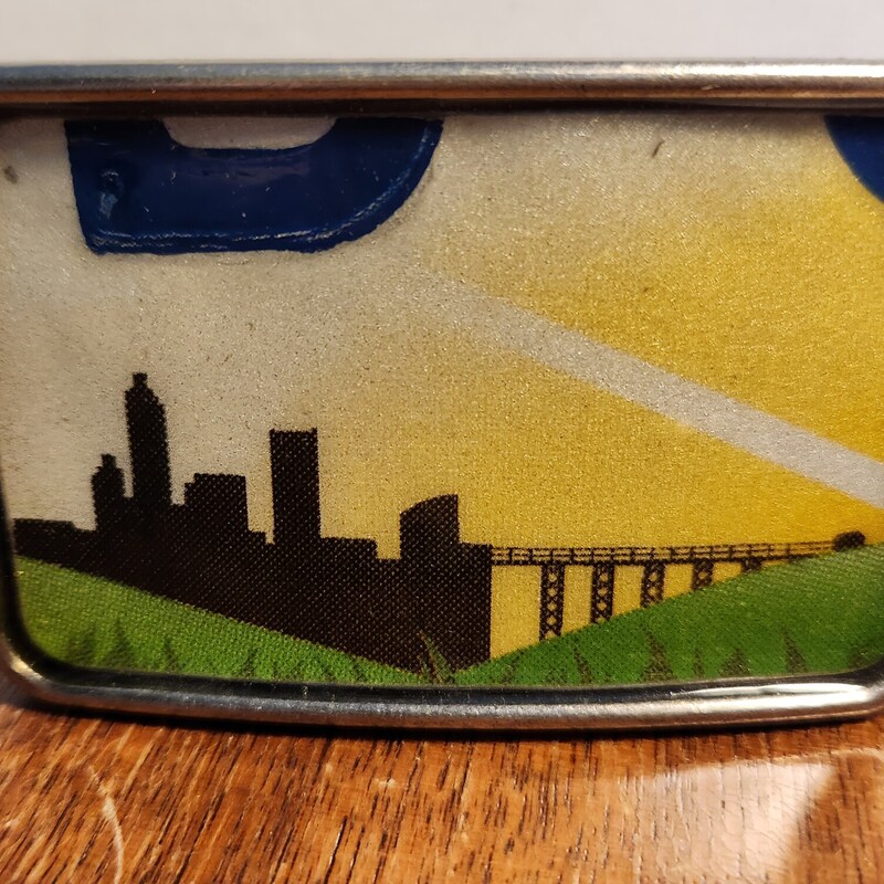 Vintage License Plates have been used to make resin filled belt buckles.
Made by a local friend 10 years ago.  These have not been used and have been stored.  They are approx. 3 x 2 and roughly 1/4 thick.
The belt opening is for a 1.5 wide belt.   They are  a one of a kind find
PLATE FROM OHIO