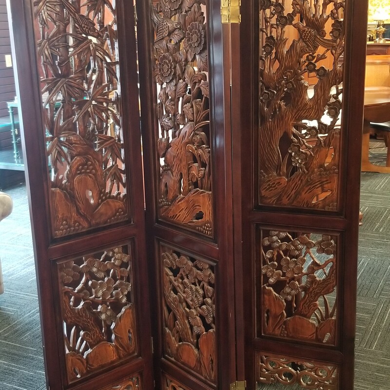 Carved folding screen. Four 18in wide panels 72.5in high.