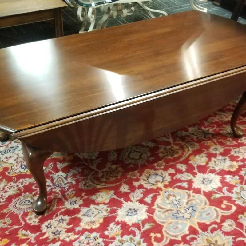 Cherry drop leaf coffee table. 51in x 23in top