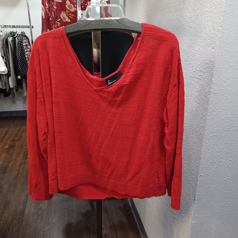 Love this super light weight red sweater. It runs on the shorter side with the higher hemline but is perfect with your favorite jeans.