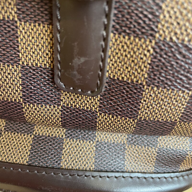 LV Manosque Damier GM As Is, Brown Damier Check Design, Hook and Eye Closure, Some Scuffs Around the Bottom Leather Detailing, 2 Front Pocket with Buckle Closures (One Has Some Cracking at the Buckle), Interior Orange Fabric Has Some Staining and Ink Marks, Size: Length: 13 in, Height: 11 in, Width: 5.5 in, Drop: 7 in