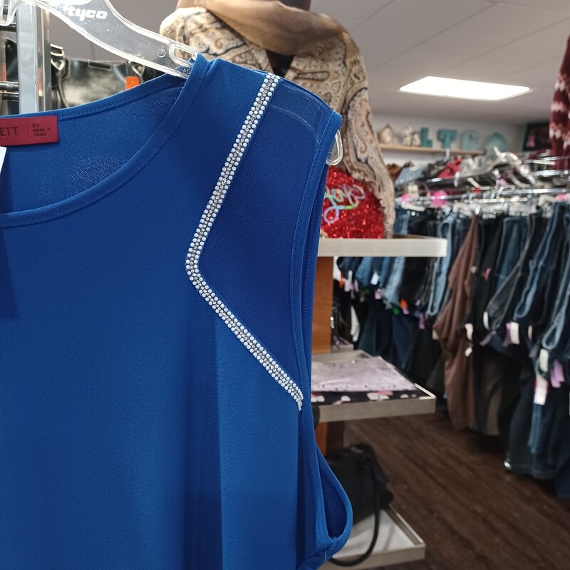 A cami never looked so good! Brand new with tags and retails for $54! by Love Scarlet this cami has wide shoulder straps and sports a mesh panel and then some major bling by each arm!
