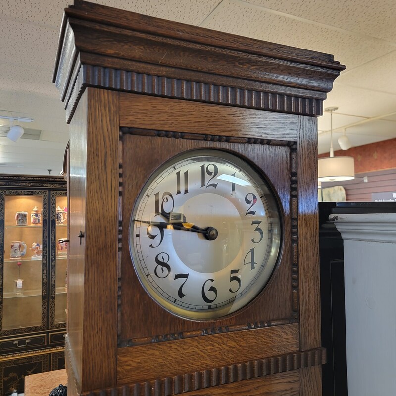 Antique Continental Oak Grandfather Clock Circa 1900.  Runs and keeps time!  Has a solid Oak case andvbeveled glass.  Beautiful clock!