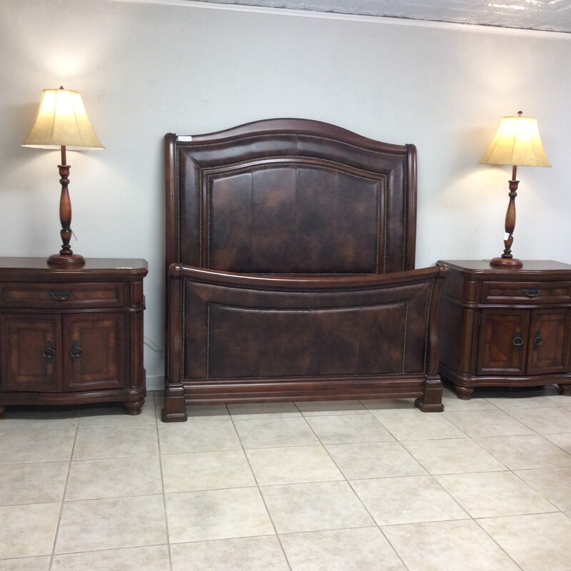 This is a beautiful Ashely Queen bedroom set that includes a Headboard and Footboard and 2 night stands. The night stands are large, have 1 drawer and a cabinet with a shelf.