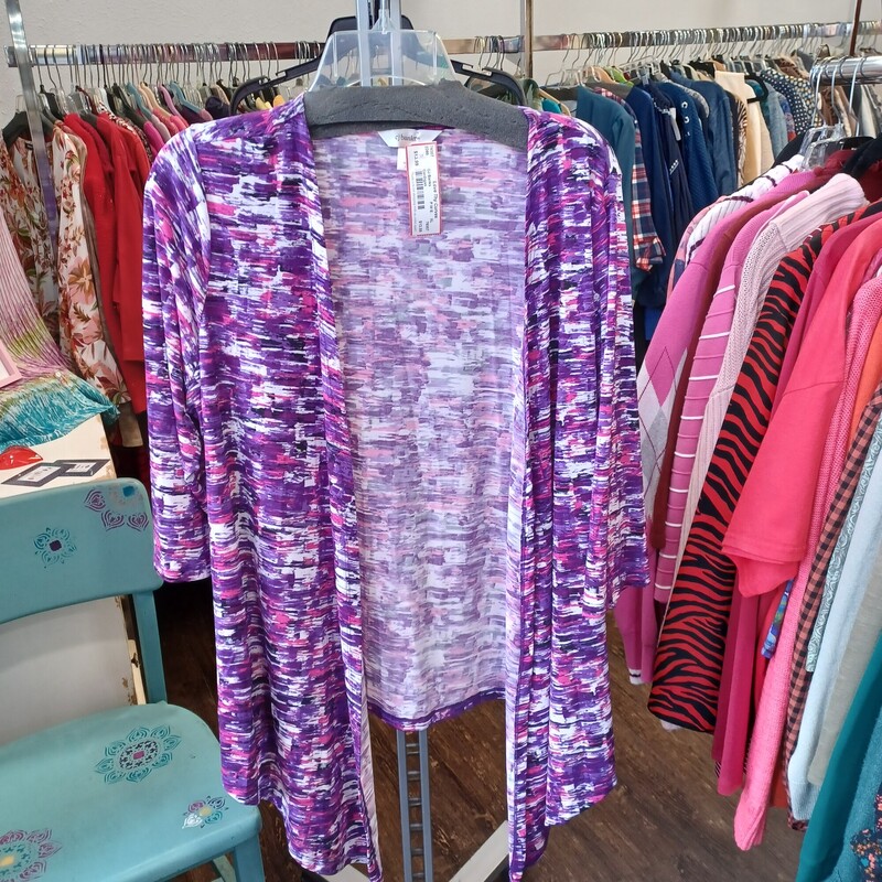 Love this light weight activewear style cardigan in half sleeves and a purple, pink, black and white mixed print. So comfy and convenient for most any look.