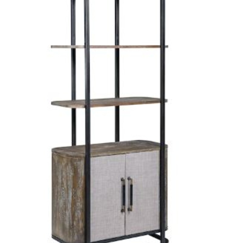 Bradenton Bar/Etagere
Brown Black  Size: 32x17x32H
Metal framework rises up and cradles a two door shelved compartment below, which has been finished in our Bradenton Brown with the same beautifully rounded edges and striking cloth covered door fronts. Open shelving rises up, providing a you with a dramatic display area. An impressive design for your home or office.
Retail $1100