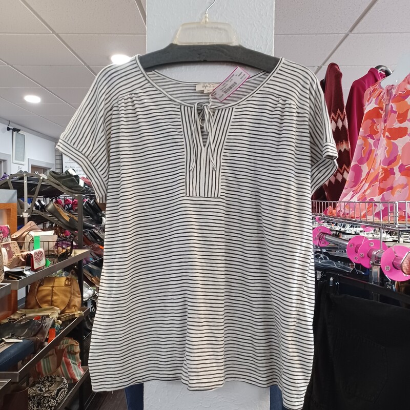 Short sleeve knit top in black and white stripe that is perfect for any season. Can be dressed up or down and used weekly.