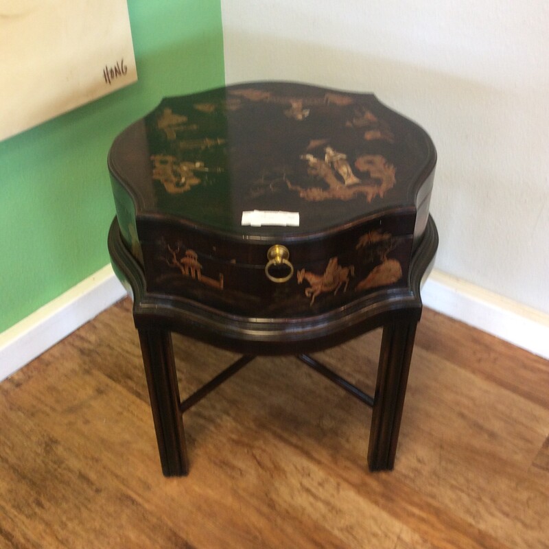 This is a beautiful oriental removable tray top table with gold accents.