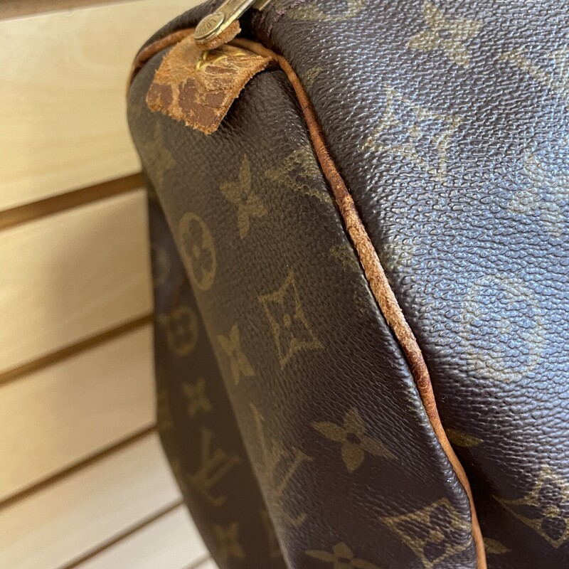 Reduced now to 269.99!!!! Was $449.99<br />
<br />
L. V.  Speedy 35 Purse with Lock and Key As Is, Brown Logo Monogram Coated Canvas with Canvas Interior, Several Stains Throughout the Interior Lining, One Small Interior Pocket - Has Staining and Leather Opening is Cracked, Water Marks and Cracking on the Leather Exterior Handles and Piping, Torn and Cracked Leather on the Zipper Pull Tabs and the Zipper<br />
<br />
Size: 13.75x7x8.5 inches<br />
<br />
Reduced now to 269.99!!!!<br />
<br />
*Additional shipping and insurance rates will apply. A separate invoice will be sent due to the value of this item.